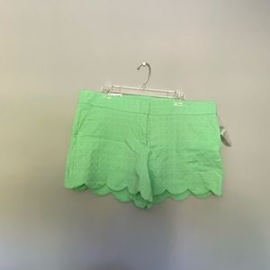 Green scalloped chino shorts